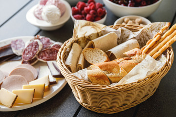 Basket full of french bread on the table