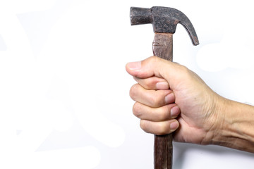 Hand holding hamer on white background
