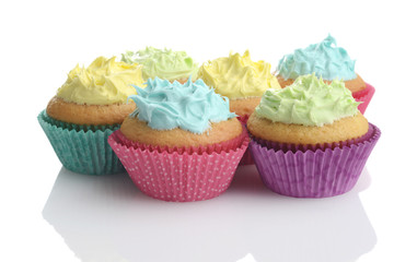 pile of colorful easter cupcakes