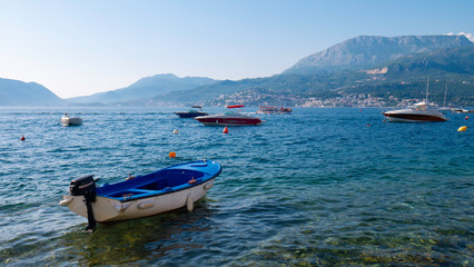 Fototapeta na wymiar Boats in the small marina of the village of Rose - August 6, 2019 / Rose Village, Lustica peninsula, Kotor Bay, Montenegro, Europe.