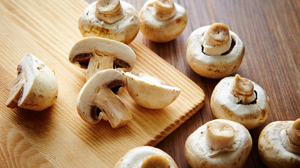 Mushroom on wooden cutting board 