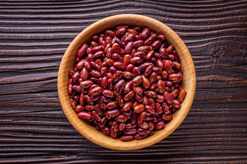 Fresh organic natural beans on wooden rustic background