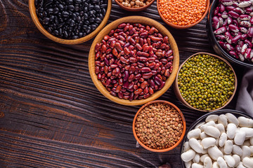 Fresh organic natural beans on wooden rustic background