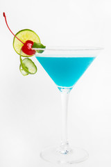 blue lagoon cocktail decorated with lime fresh cocktail with blue curacao or blue hawaiian alcohol  