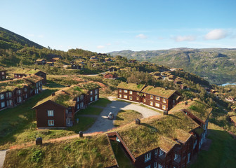 Typical norwegian house with grass on the roof at Haukelifjell Skisenter