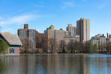 Fototapeta na wymiar The Harlem Meer at Central Park with a Skyline View in New York City during Spring