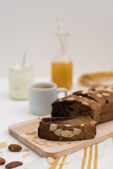 Home made banana bread for breakfast with coffee, juice and yoghurt