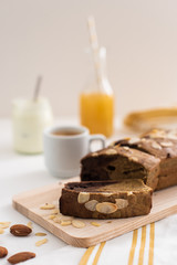 Home made banana bread for breakfast with coffee, juice and yoghurt