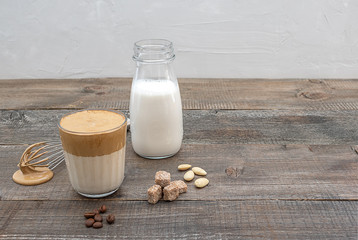 Homemade version of dalgona coffee, popular Korean drink with almond milk and cane sugar. 