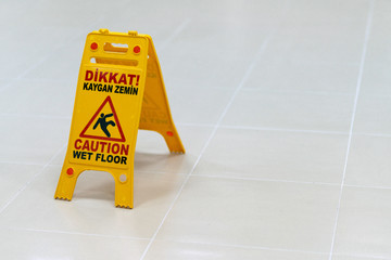 Warning signs for slippery floors