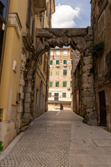 Fototapeta na wymiar Old Gateway or Roman Arch of Rijeka, Croatia. One of the most famous tourist attractions. June 2019