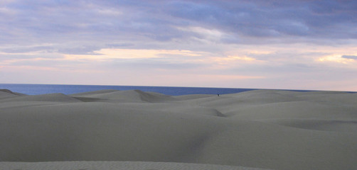 Beautiful view of the dunes in Maspalomas beach during the sunset. South of Gran Canaria Island. Spain.