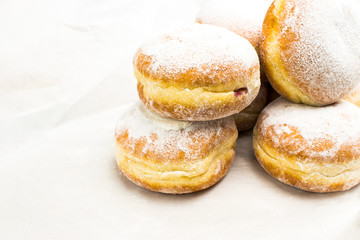 Donuts with frosting. Delicious doughnuts on the table.