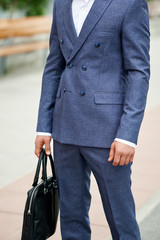 Attractive bearded young man in classic suit. Elegancy and male