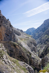 Fototapeta na wymiar nice mountain road with cliffs, feeling of freedom and stunning views