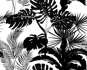 black and white seamless pattern of tropical plant silhouettes: palm leaves, monstera, banana palm