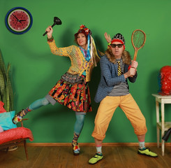 Funny couple of freaks fool around in the studio