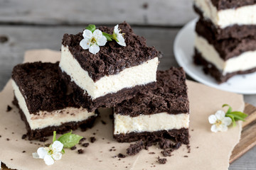 Royal cheesecake with with chocolate crumbs. homemade cottage cheese dessert with chocolate dough