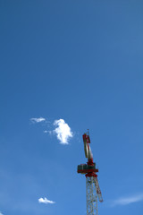 Obraz premium metal crane,building,sky,blue,cloud,white,high, steel, structure,