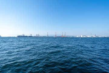 Fototapeta na wymiar Cranes at harbor