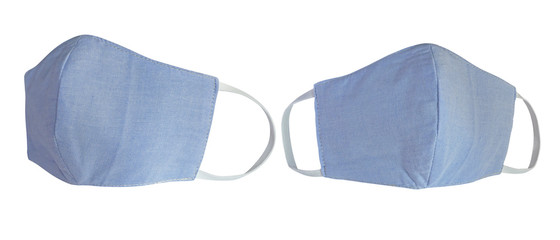 Light blue pastel cotton cloth face masks isolated on white with clipping path. Due to lack of medical protective masks during Coronavirus (COVID-19) pandemic, regular people instead wear cotton masks