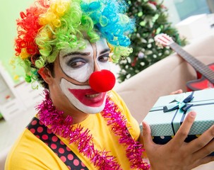 Funny clown in Christmas celebration concept