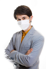 is time to protect all the time. elegant man wearing a mouth protection to prevent getting sick at work