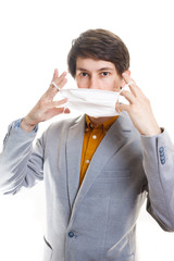 Coronavirus virus in 2020 flu, epidemic. a man wears a protective mask on a white background