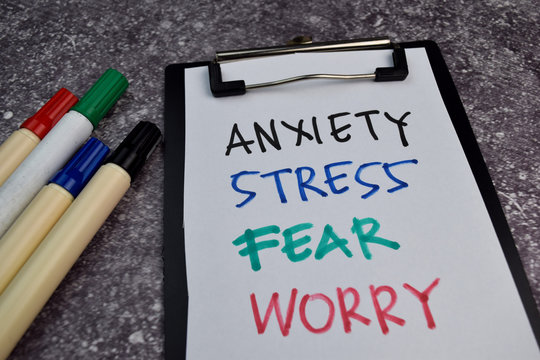 Anxiety, Stress, Fear, Worry Write On Sticky Notes Isolated On Office Desk.