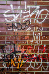 graffiti on brick wall