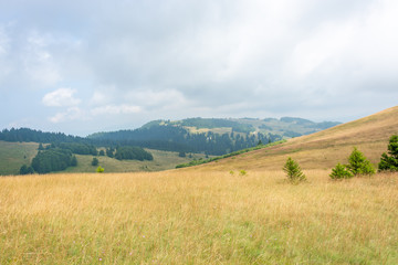 Hill Slopes and Cloudy Sky