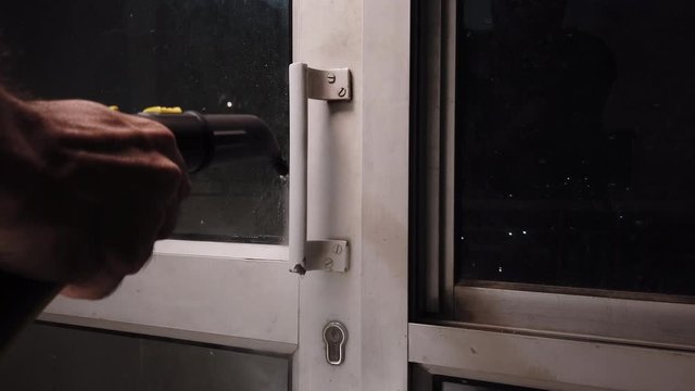 Steam cleaning door handles to sanitise and sterilise home by killing germs and viruses to protect from Covid 19 or Corona virus infection. Fast way to disinfect knobs quickly and effectively. 