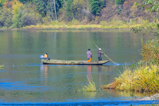 fishermen on a motor boat