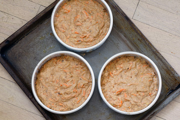 Raw batter for a vegan carrot cake in a cake mold