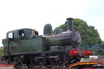 Obraz na płótnie Canvas Steam engine on the track