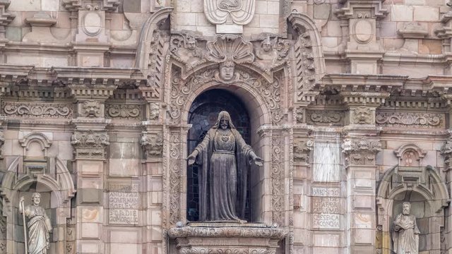 Staue on The Basilica Cathedral of Lima is a Roman Catholic cathedral located in the Plaza Mayor timelapse hyperlapse in Lima, Peru. Close up view to decoration elements