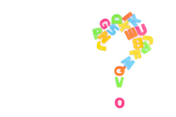 Multicolored letters of the English alphabet in the form of a question on a white background.