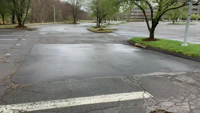 An empty parking lot of an office building 