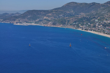 View of the sea bay and ships from the high hill. Beautiful sea landscape on a clear summer day.