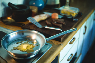 Melting butter in olive oil before cooking breakfast