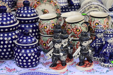 Closeup handmade pottery with blue pattern produced in Boleslawiec, Poland