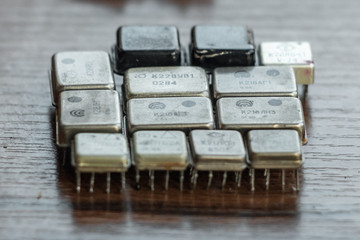 Kyiv, Ukraine - April 2020 Old soviet union metallic microchips. Close up of obsolete used...