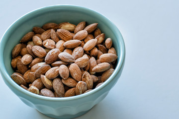 Roasted Almonds in a blue bowl