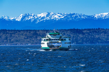 Fototapeta na wymiar Washington State Ferry Boat Olympic Mountain Range Edmonds Washington