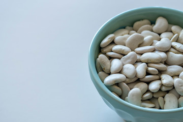Lima beans in a blue bowl