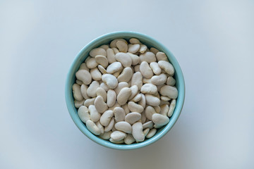 Lima beans in a blue bowl