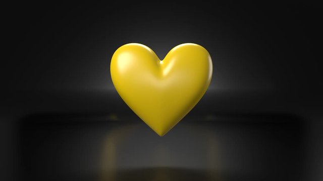 Pulsing yellow heart shape object on black background.
Loop able 3D animation.