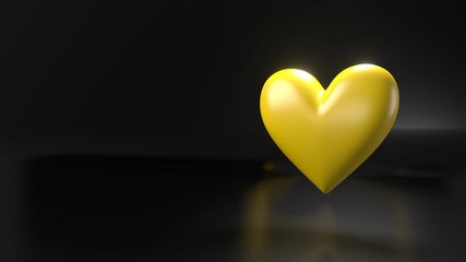 Pulsing yellow heart shape object on black text space.
Loop able 3D animation.
