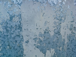 Metal plate background with peeling paint