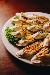 Stock Photo - Vegetable savory strudel. Cheese roll